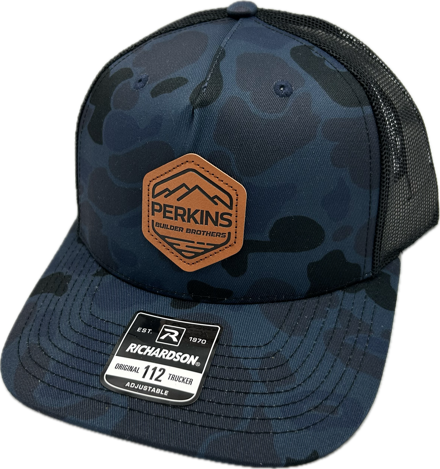 Genuine Leather Patch - Richardson 112PFP Snapback Trucker Hat - Admiral Duck Camo/Black - Perkins Builder Brothers