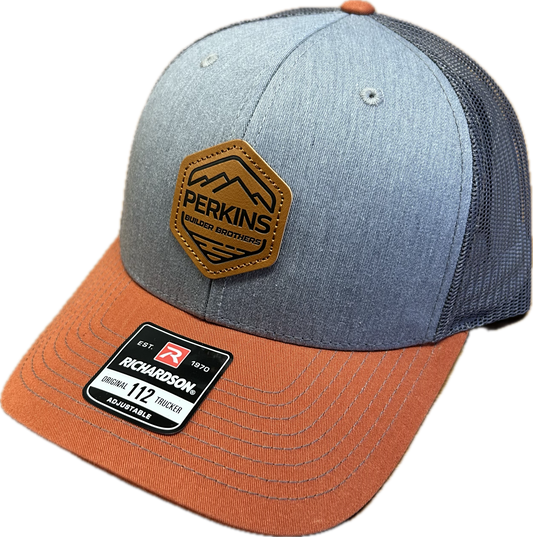 Genuine Leather Patch - Richardson 112 Snapback Trucker Hat - Grey/Charcoal/Dark Orange - Perkins Builder Brothers