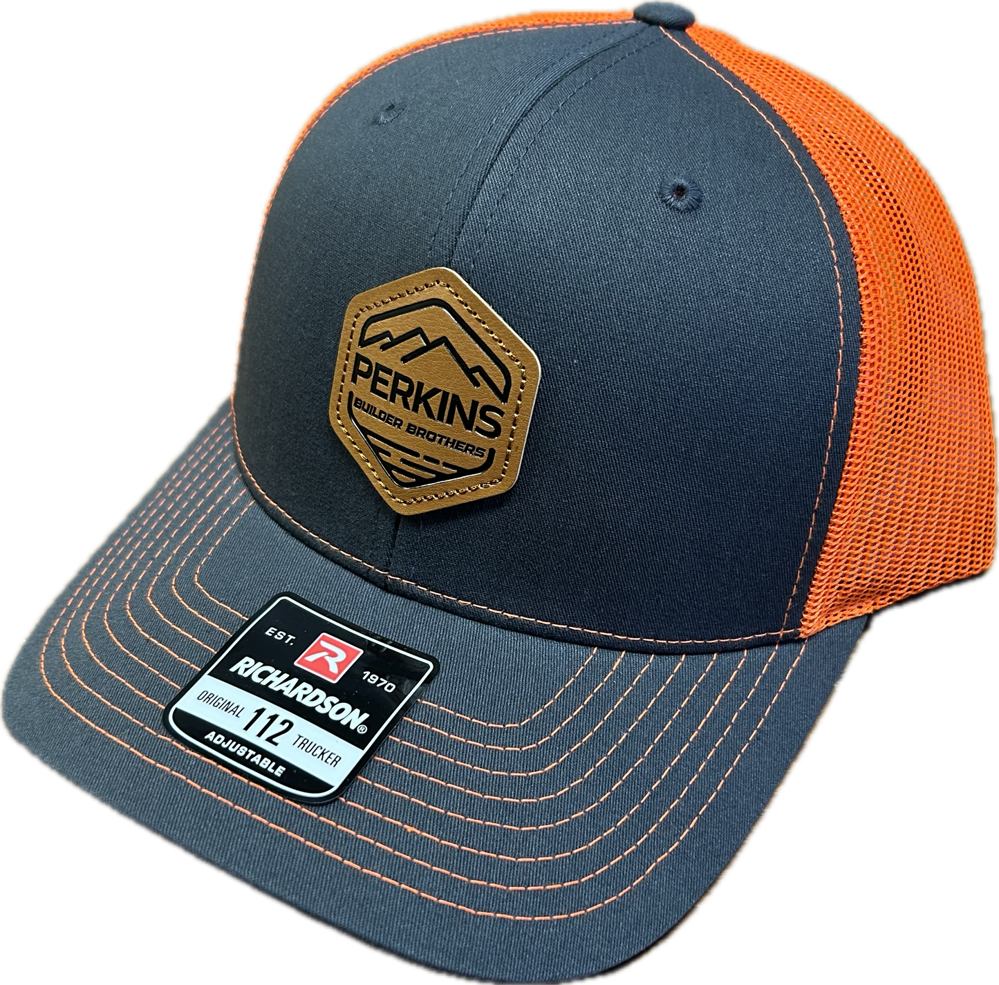 Genuine Leather Patch - Richardson 112 Snapback Trucker Hat - Charcoal/Safety Orange - Perkins Builder Brothers