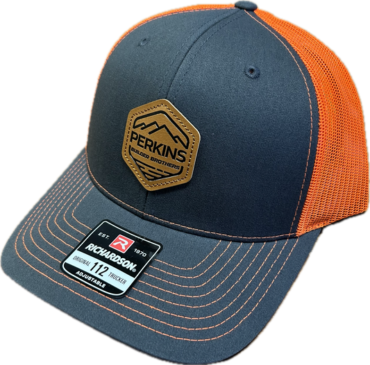 Genuine Leather Patch - Richardson 112 Snapback Trucker Hat - Charcoal/Safety Orange - Perkins Builder Brothers