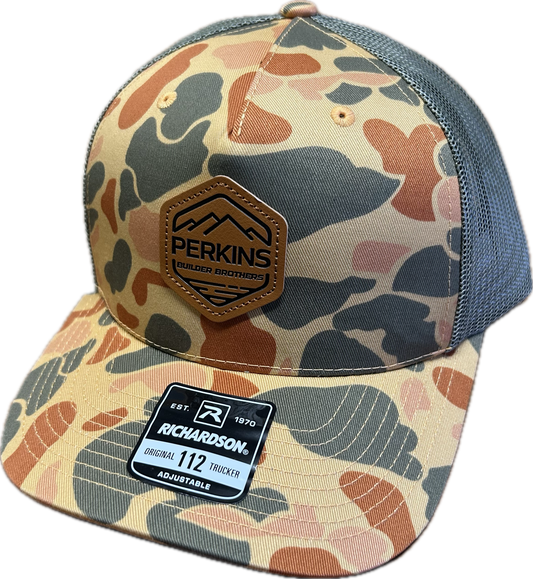 Genuine Leather Patch - Richardson 112 Snapback Trucker Hat - Sienna Duck Camo/Loden - Perkins Builder Brothers