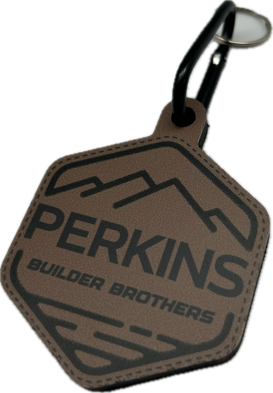 Llavero con parche de piel sintética - Perkins Builder Brothers