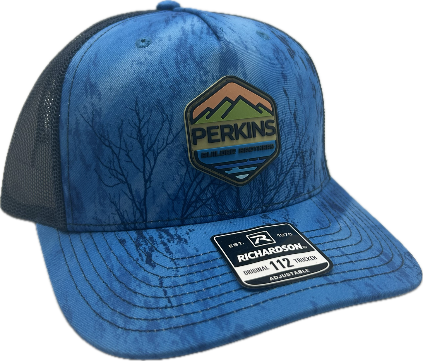 Full Color Rubber Patch - Richardson 112PFP Snapback Trucker Hat - Realtree Fishing Lt. Blue/Navy - Perkins Builder Brothers